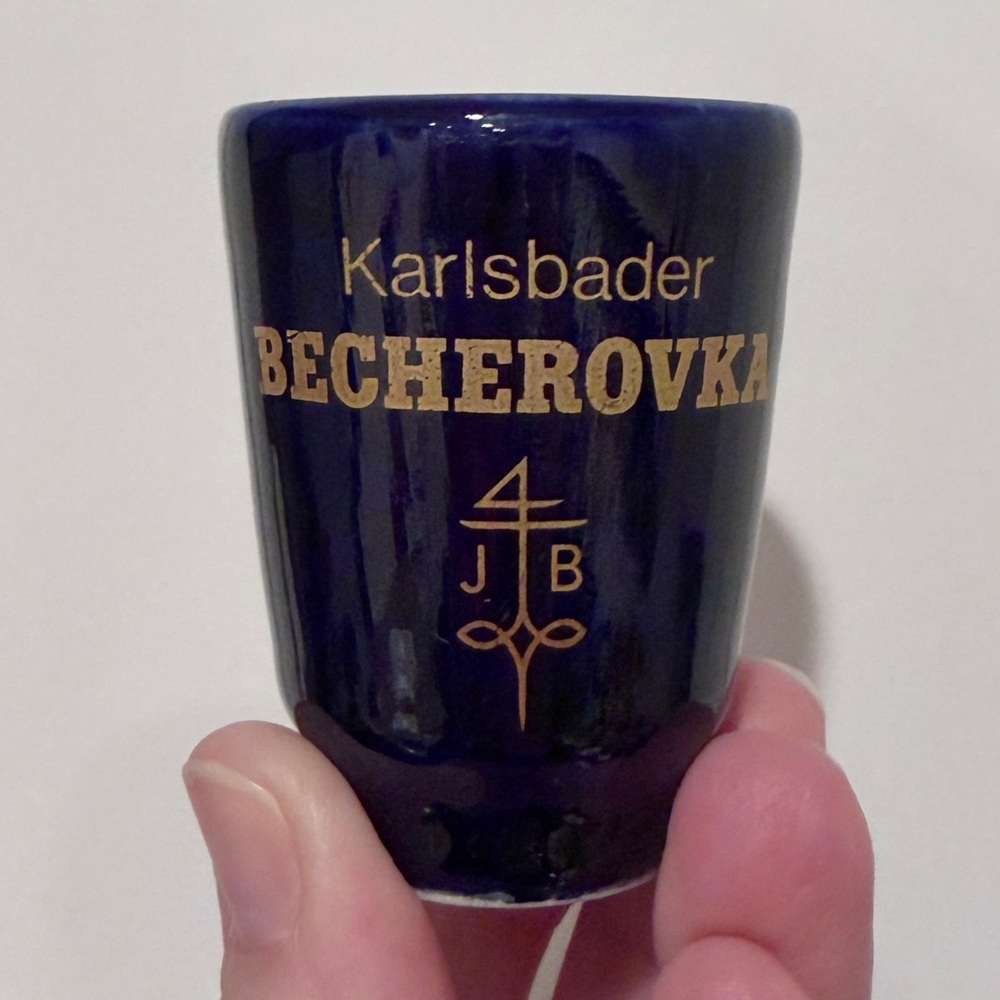 Vintage cobalt blue Karlsbader Becherovka ceramic shot glass with handle